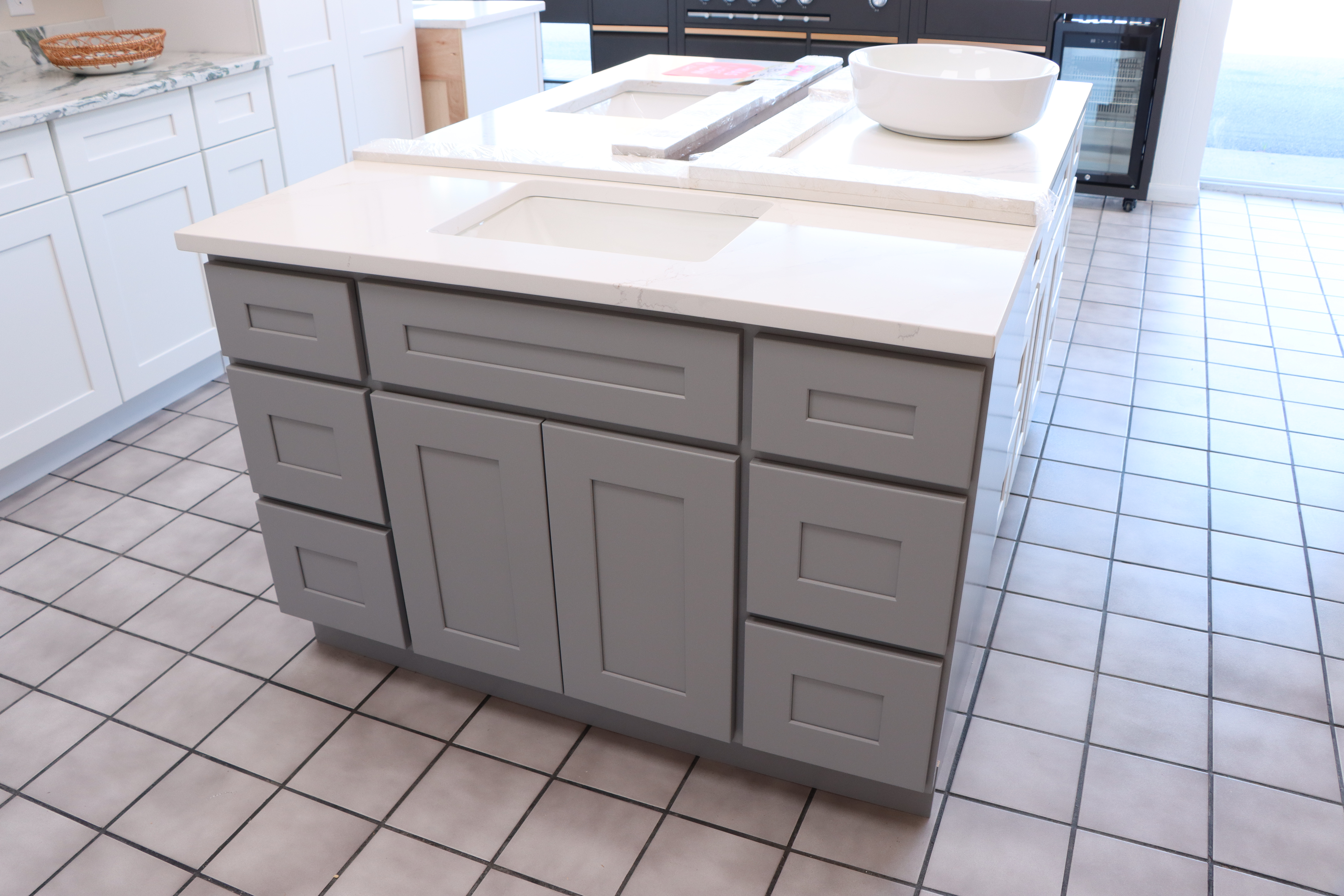 Gray and white bathroom vanity showroom display