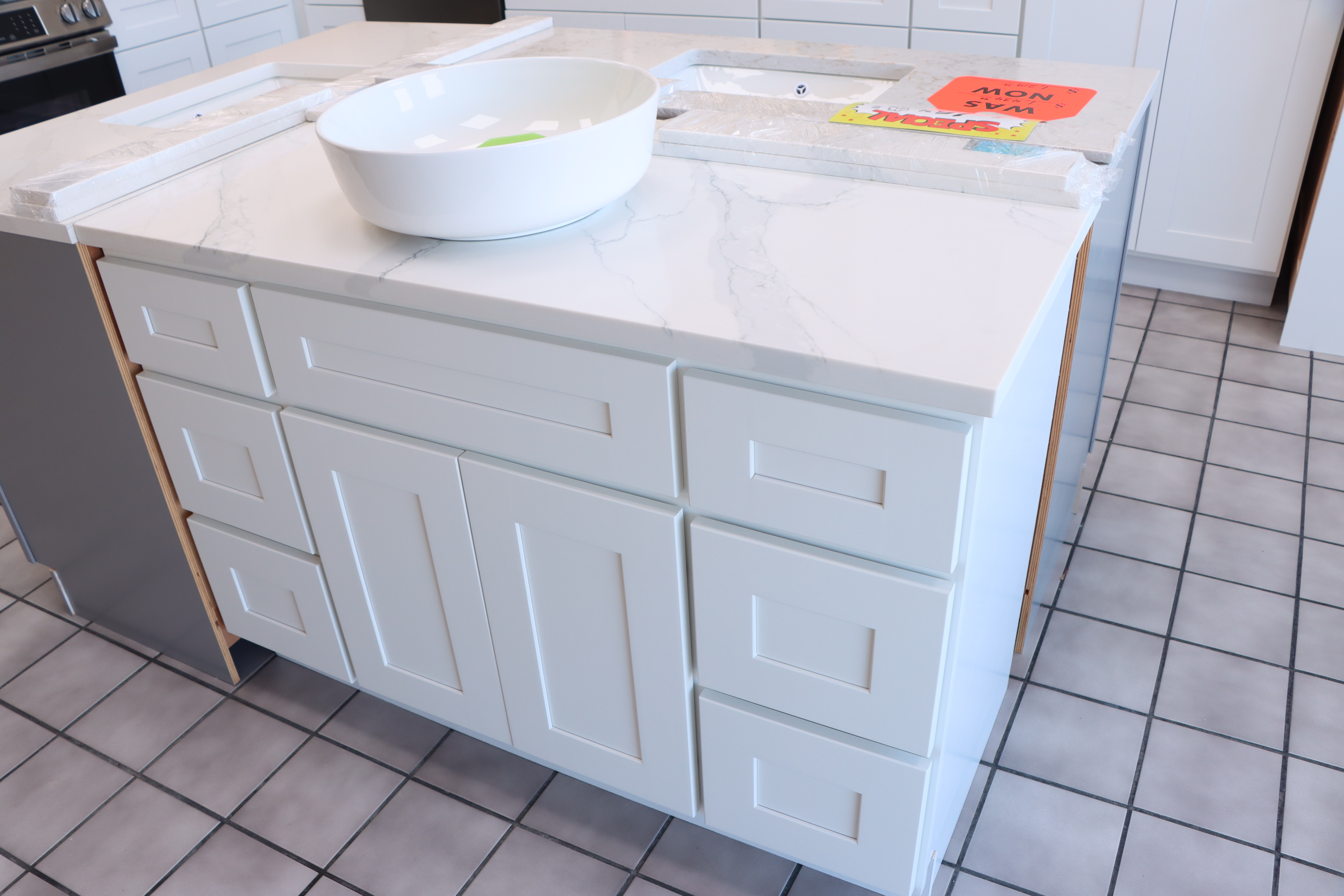 White bathroom vanity display from side angle